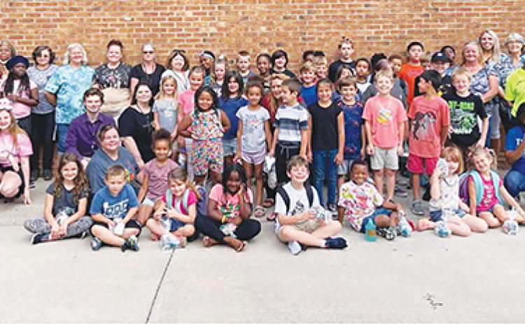 Students and instructors gather for the 21st Century Community Learning Center’s summer camp at Ochwilla Elementary School.
