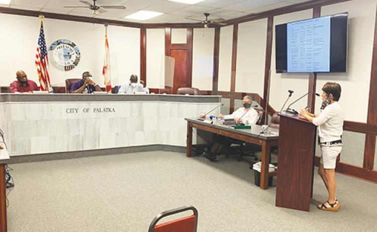 Revitalize Historic Palatka President Robbi Correa gives Palatka officials an update on locals businesses at Monday night’s Community Redevelopment Agency meeting.