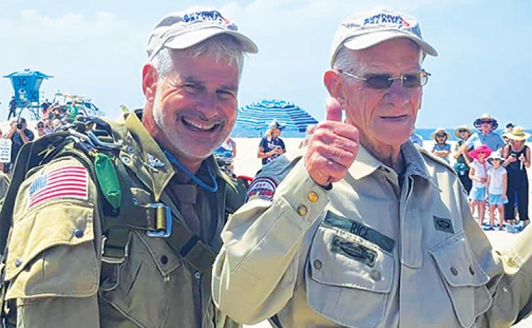 Skydive Palatka owner Art Shaffer, left, and World War II veteran Tom Rice, 100, smile Sunday after skydiving in California to celebrate Rice’s birthday.