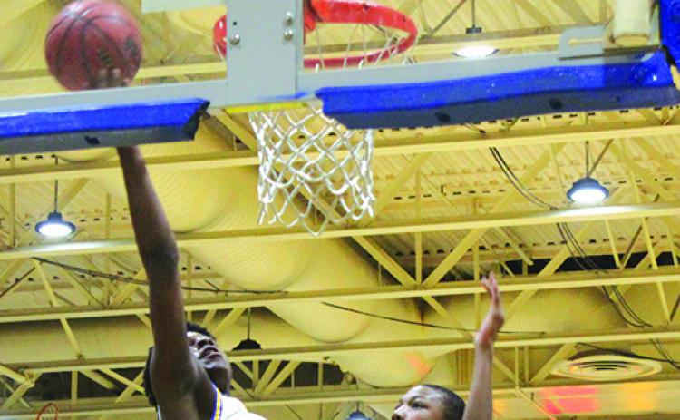 Vanari Johnson goes up for a layup last December for Palatka in a game against Gainesville. (MARK BLUMENTHAL / Palatka Daily News)