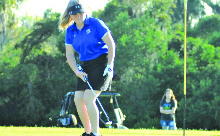 Palatka’s Samantha Clark attempts an eagle putt on the eighth green in the District 4-2A girls golf tournament on Tuesday at the Palatka Municipal Golf Club. (GREG WALKER / Daily News correspondent)