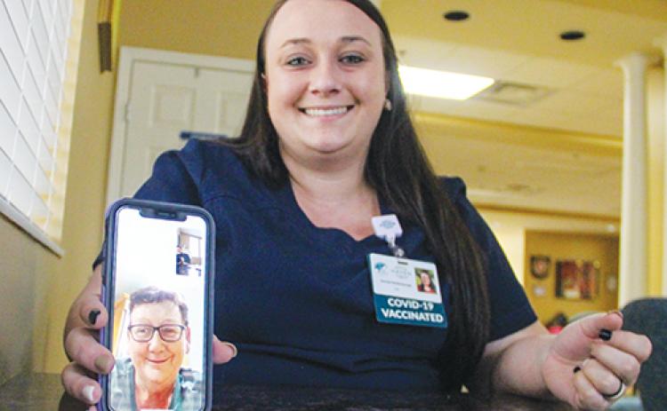 Sharon Matthewson video chats from Ireland on Monday with Rachel Reidenbaugh, a licensed practical nurse from Haven Hospice Roberts Care Center in Palatka.