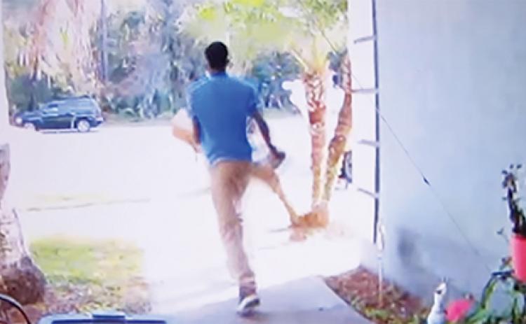 Door camera footage captures a man stealing a package from a San Mateo home earlier this month.