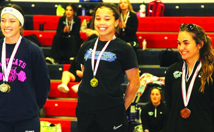 Interlachen’s Mikah Harvey smiles after winning the 119-pound title at the District 8-1A meet Wednesday. (COREY DAVIS / Palatka Daily News)