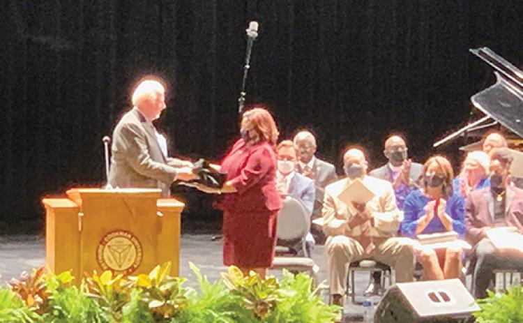 Judge Alicia R. Washington is sworn in during an investiture ceremony Friday at Bethune-Cookman University in Daytona Beach.