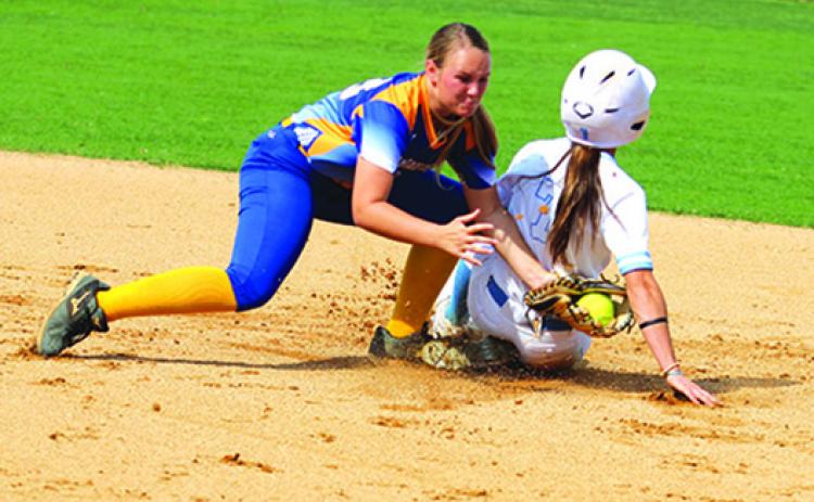 St. Johns River State College’s Emily Stewart is tagged out at second base on a steal attempt by Florida State College-Jacksonville shortstop Karleigh Clay during the first game of a doubleheader Thursday. (MARK BLUMENTHAL / Palatka Daily News)