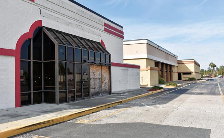 The movie theater that used to operate at the Palatka Mall, which was recently sold, is now closed with boards replacing some of the windows.