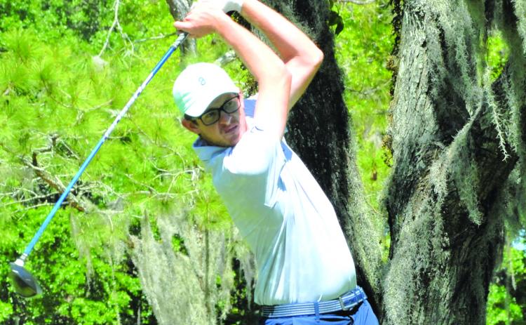 Cody Carroll of Middleburg hits his drive off the No. 11 tee on his way to winning the 65th Azalea Amateur Golf Tournament Sunday at Palatka Municipal Golf Course. (GREG WALKER / Daily News correspondent)