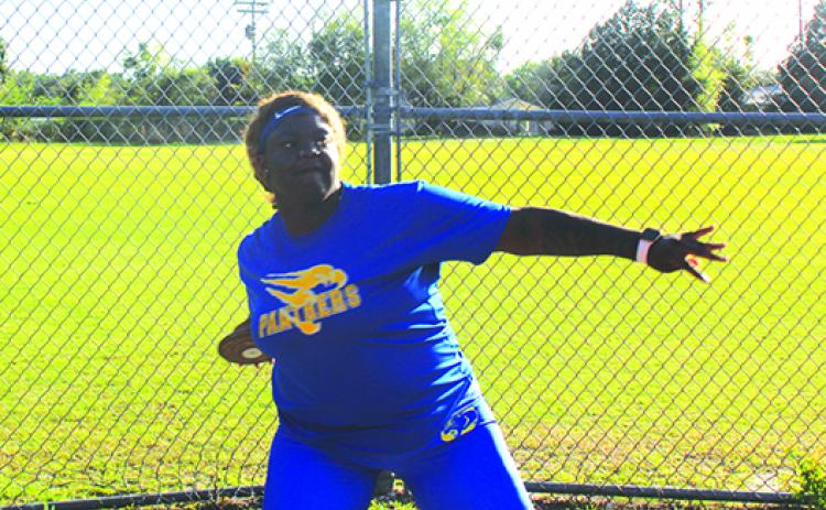 Palatka’s Torryence Poole gets set to uncork a throw during the discus competition at the Senior Night meet at Palatka Junior-Senior High School Tuesday. Poole won the event. (MARK BLUMENTHAL / Palatka Daily News)