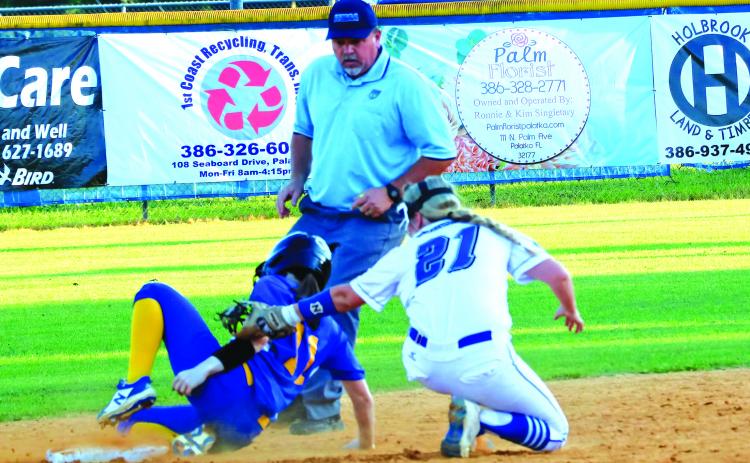 Palatka’s Whitney Seebacher steals second in front of the tag of Clay’s Gabrielle Wiseman in the fourth inning of Monday’s game. (RITA FULLERTON / Special to the Daily News)