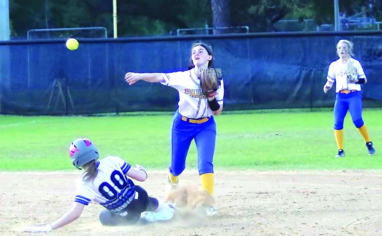 Palatka’s Whitney Seebacher fires to first base to try and complete a fourth-inning double play as Interlachen’s Erin Jacobsen slides in late to try and break the play up. Natali Valdez beat the play at first base. (RITA FULLERTON / Special to the Daily News)