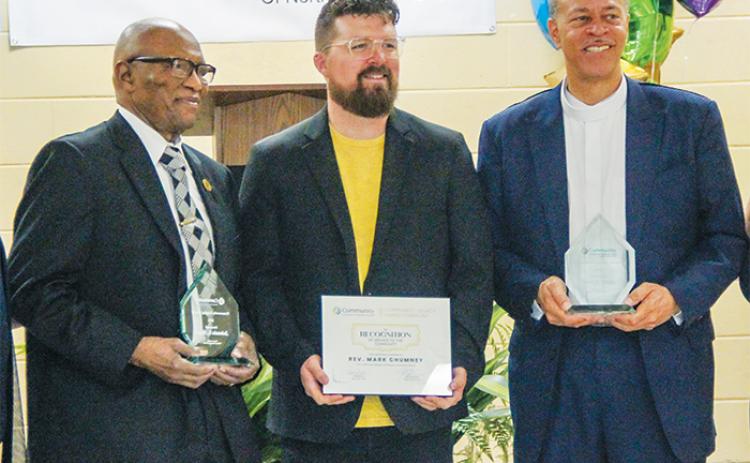 From left, church leaders Johnnie Shaw, Mark Chumney and Karl Flagg smile after being honored by Community Hospice & Palliative Care of North Central Florida on Thursday.