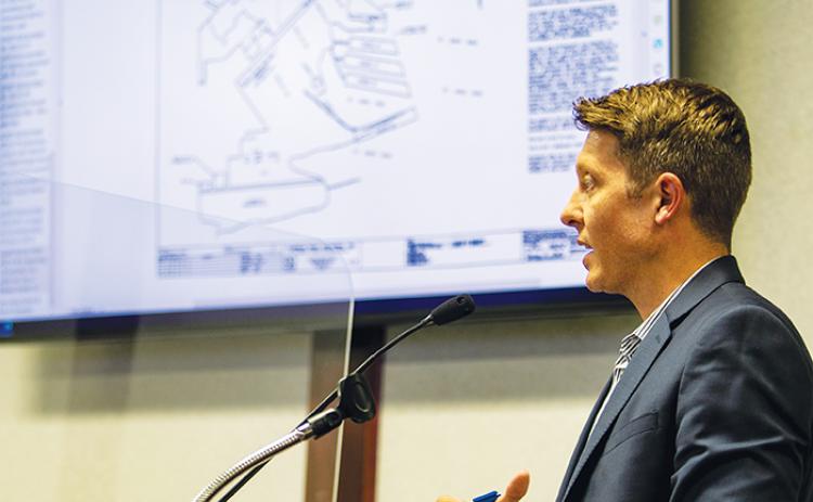Public Works Director Jonathan Griffith talks to the Palatka City Commission on Thursday about a brownfield designation for the Cypress Cove property.