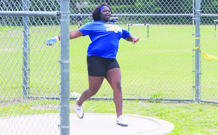 Palatka’s Torryence Poole, shown throwing the discus at the April 21 District 5-2A meet, will return to the FHSAA 2A championships in Gainesville after winning the Region 2-2A shot put at Winter Garden Horizon High. She also finished third in discus. (MARK BLUMENTHAL / Palatka Daily News)