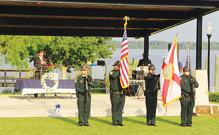 Putnam County sheriff's deputies present the colors at Tuesday's memorial service.