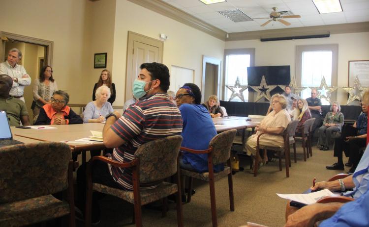 Attendees at a Wednesday discussion consider whether a business incubator would be good for Palatka's future.
