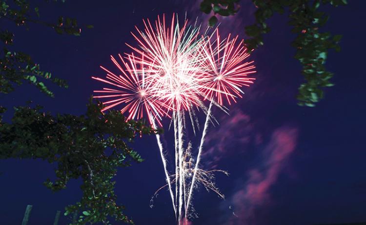 Fireworks explode over the banks of the St. Johns River in Palatka on Monday as revelers take part in the city’s Independence Day celebrations.
