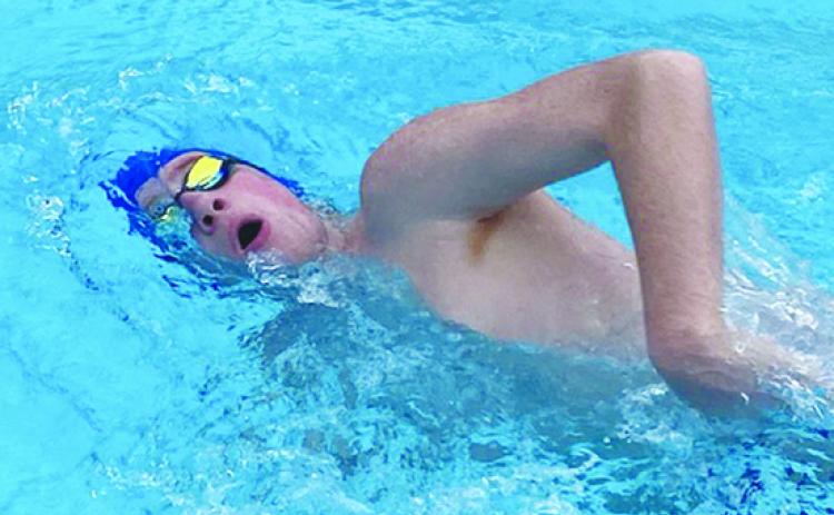Palatka’s Parker Gill swims the second leg of the boys’ 200-yard freestyle relay in a dual meet against Palm Coast Matanzas Thursday at the Putnam Aquatic Center. The Panthers won the relay in 1:40.74. (COREY DAVIS / Palatka Daily News)