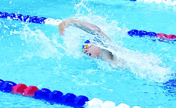 Palatka’s Grant Porch churns through the water during the 400-yard freestyle relay on Thursday against Yulee at the Putnam Aquatic Center. (COREY DAVIS / Palatka Daily News)