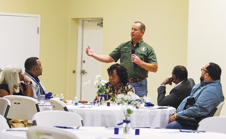 Putnam County Sheriff Gator DeLoach talks to faith leaders Monday about ways to bridge the divide between the Black community and law enforcement.