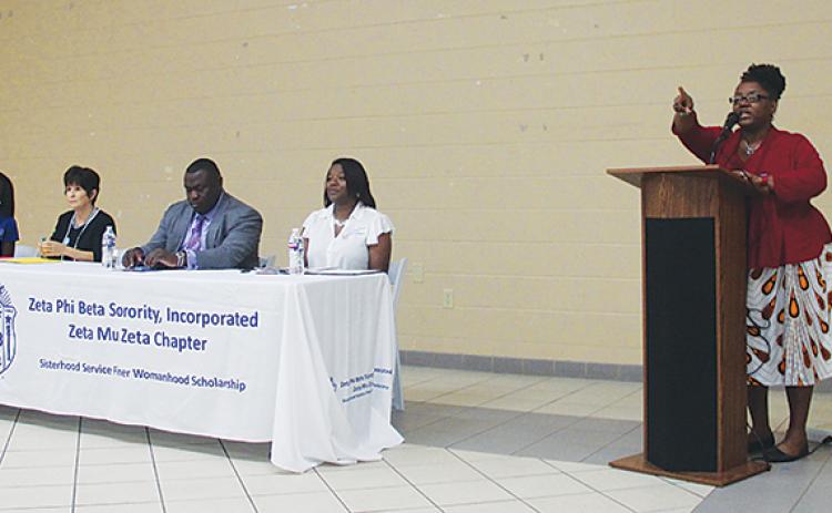 Moderator Pamela Brown, far right, points to an audience member during a question-and-answer portion of Tuesday's forum. From left to right, organizer Sheree Clayton, mayoral challenger Robbi Correa, Palatka Mayor Terrill Hill and County Commission candidate Latoya Anderson Robinson all attended.