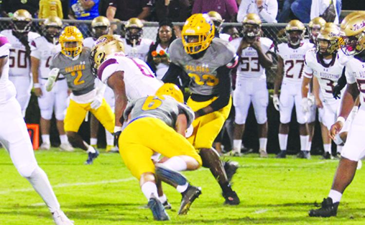 Palatka’s Jason Purcell (6) makes a tackle on St. Augustine running back Devonte Lyons last Friday. (MARK BLUMENTHAL / Palatka Daily News)