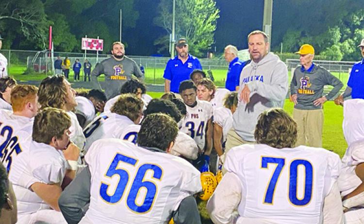 Palatka football coach Patrick Turner addresses his players after having their season end against Baldwin, 29-12, in the regional first round Saturday night. (COREY DAVIS / Palatka Daily News)