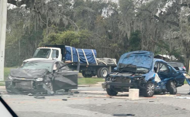 JENNIFER MOATES/Palatka Daily News Damaged cars stand in the area of Masters Road and Highway 17 following a collision Wednesday morning.