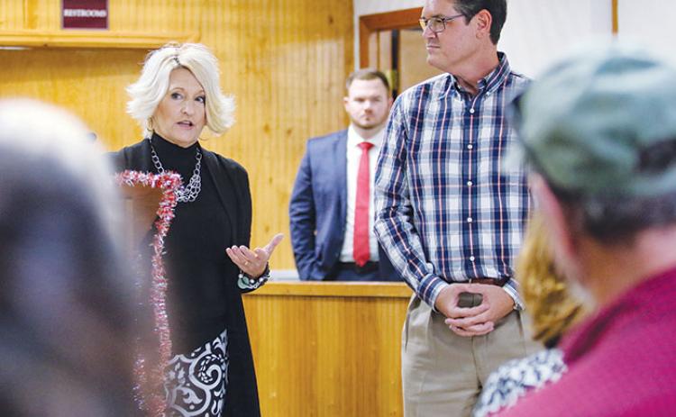 Crescent City Mayor Michele Myers, left, talks with Florida Secretary of State Cord Byrd earlier this month as he toured the city. That visit led to some of the city’s legislative requests.