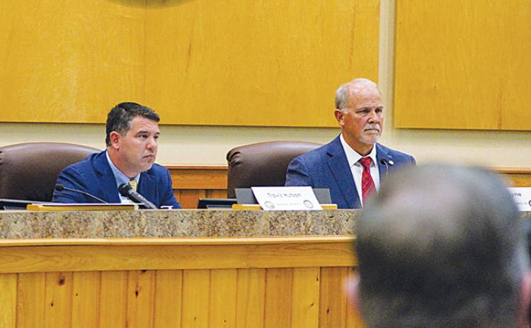 State Sen. Travis Hutson, R-Palm Coast, left, and state Rep. Bobby Payne, R-Palatka, right, listen as their constituents request state funding Monday in Palatka.