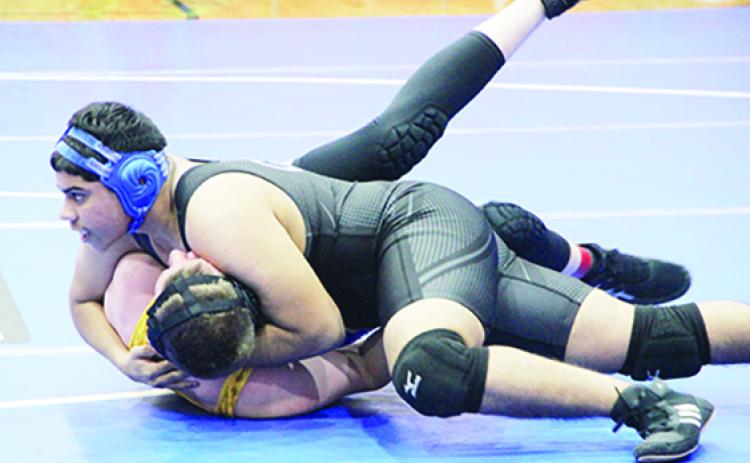 Interlachen’s George Rodriguez has Union County’s Cason Forbes in pin position in the first period of their 182-pound matchup that Rodriguez would eventually get the pin Thursday. (COREY DAVIS / Palatka Daily News)