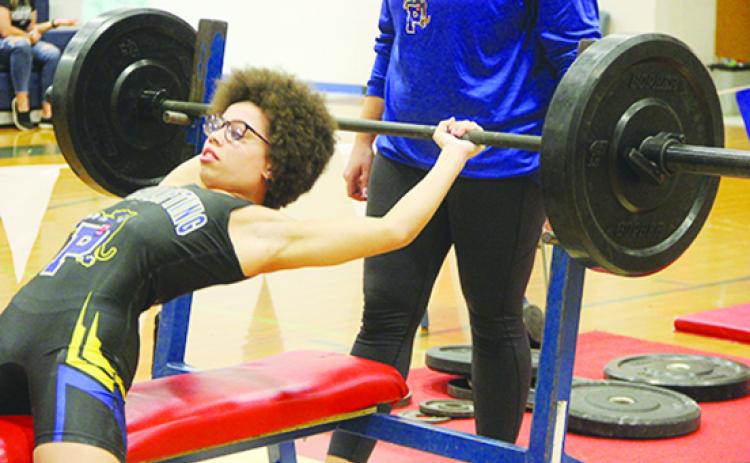Palatka’s Mikah Harvey attempts to do the bench press at 119 pounds at the District 8-1A championship at Pierson Taylor High School. Wednesday. (COREY DAVIS / Palatka Daily News)