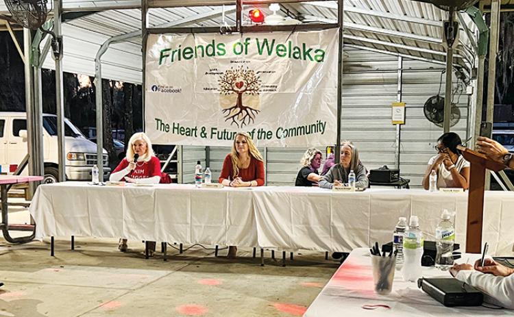 Welaka Town Council candidates answer residents’ questions during an election forum Wednesday at Shrimp R Us & More.