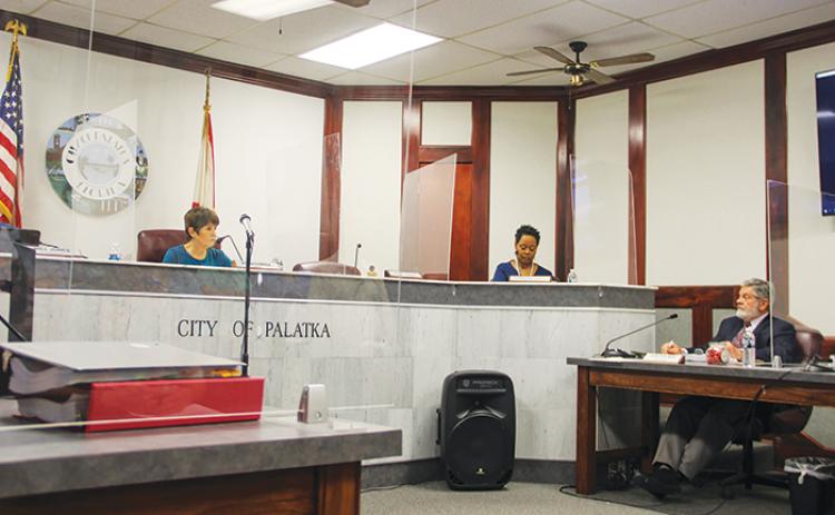 The Palatka City Commission discusses Hammock Hall with City Manager Don Holmes during Thursday’s commission meeting.