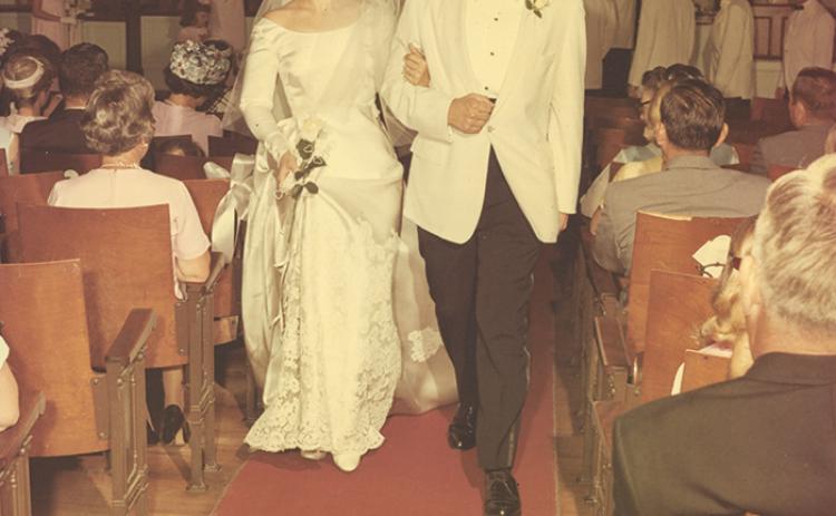 Nancy and Arlie Garrett walk down the aisle of First Baptist Church in Palatka on their wedding day, June 18, 1967.