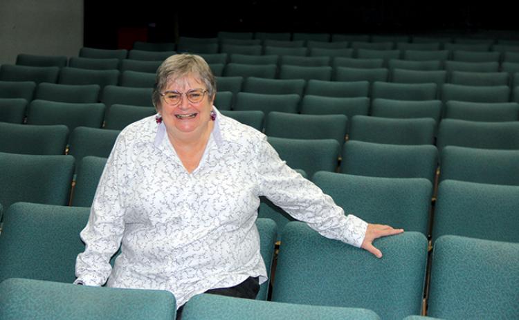 Florida School of the Arts Director Patricia Crotty is pictured in the Main Stage auditorium at St. Johns River State College, where her last play, “9 to 5 The Musical,” will be performed before she retires April 30.