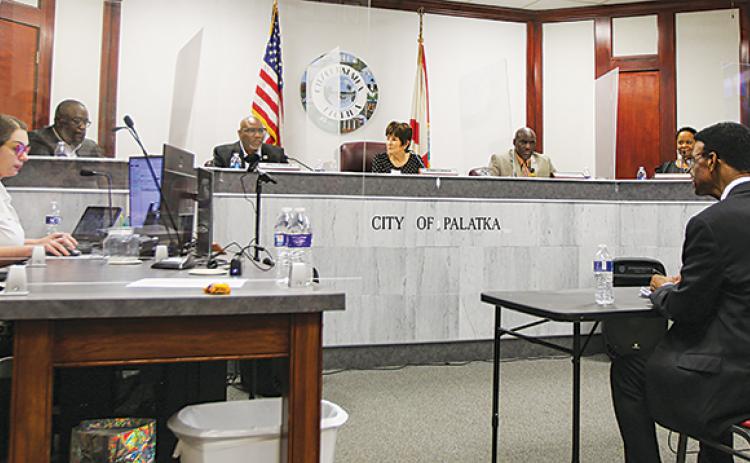 City manager candidate Vince Akhimie interviews with the Palatka City Commission on Friday. Troy Bell and Lawrence McNaul, the other two candidates, also interviewed with city officials the same day.