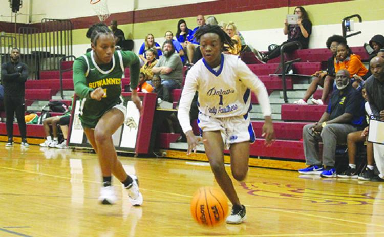 Palatka's Jhane Fountain (right) led the Panthers with 11 points Friday night in the District 5-4A final against North Marion. (MARK BLUMENTHAL / Palatka Daily News)