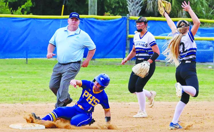 Palatka's Jazmin Keefauver slides safely into second base during the second inning Monday night, while Interlachen's Baileigh Riddley collects the ball with teammate Hailee Vickers backing her up. (RITA FULLERTON / Special to the Daily News)
