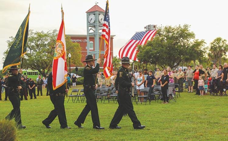 The Putnam County Sheriff’s Office Honor Guard presents the colors Tuesday evening during the 2023 Law Enforcement Memorial at the Palatka riverfront. 