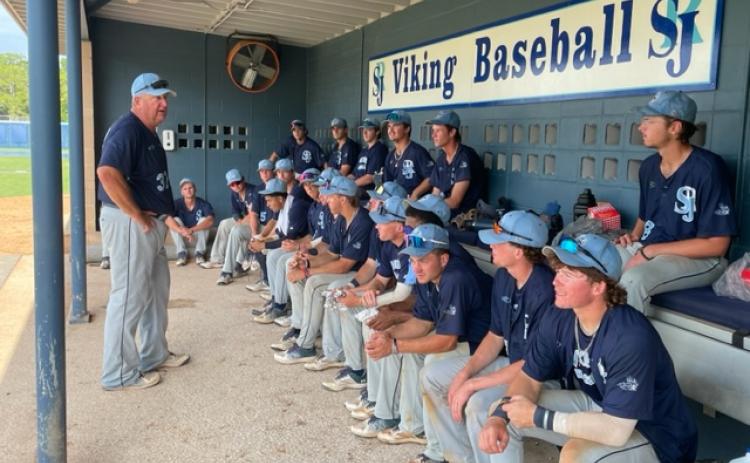 St. Johns River State College baseball coach Ross Jones talks with his team after clinching a berth to the Division II World Series on May 13. (MARK BLUMENTHAL / Palatka Daily News)
