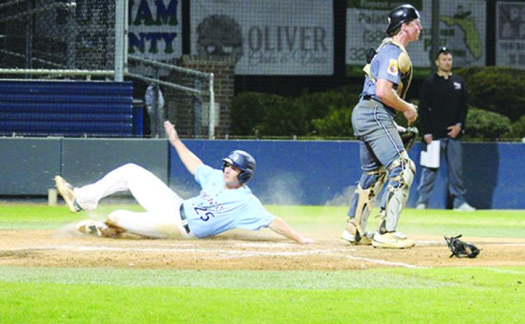 Andon Lewis, here sliding in to score a run in February against Northwest Florida State, has been one of St. Johns River State College’s top hitters this season. (MARK BLUMENTHAL / Palatka Daily News)