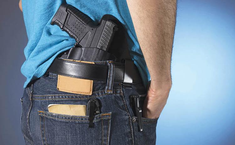 A new law allowing people to carry guns without a permit goes into effect Saturday.