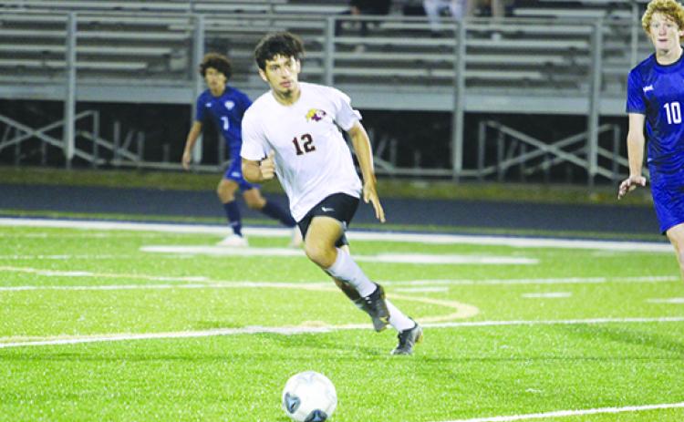 Seen playing in his last game on Feb. 11 against Melbourne Holy Trinity Episcopal, Jesus Cruz finished his career with 97 goals. (MARK BLUMENTHAL / Palatka Daily News)