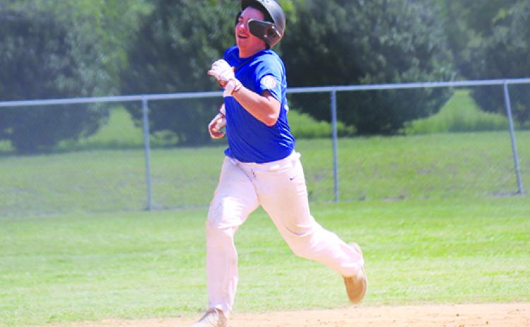 Melrose’s Rodney Blackwelder scampers to third base on a triple during Saturday’s District 5 15-U championship against Santa Fe. (Priscilla Screen / Submitted to the Daily News)