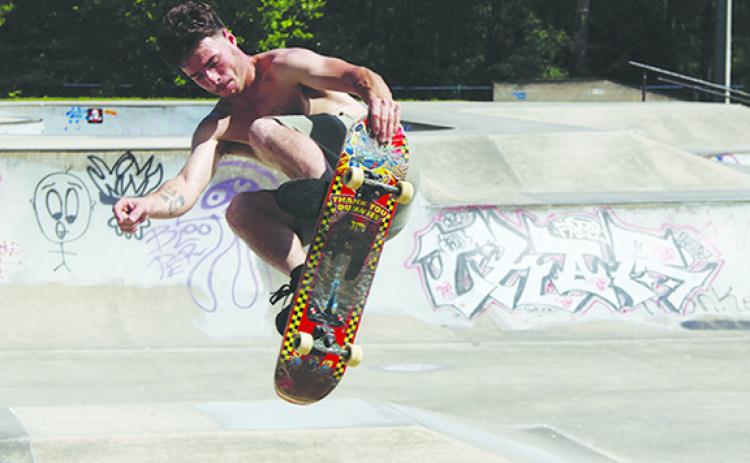An unidentified skateboarder flies through the air at Treaty Park in St. Augustine. (COREY DAVIS / Palatka Daily News)