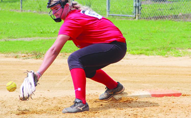 Menendez High softball player rising senior Sierra Prichard works on fielding the ball from her first base position during the North Florida Fastpitch College First Coast Future Midsummer Prospect camp Monday at Palatka Junior-Senior High softball complex. (COREY DAVIS/ Palatka Daily News)