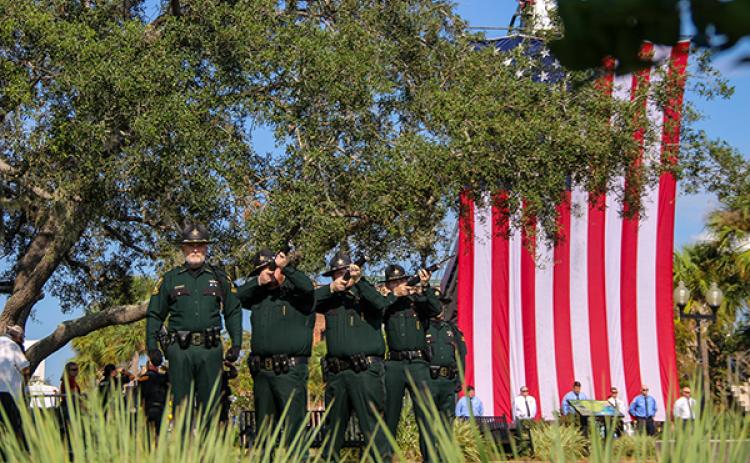 SARAH CAVACINI/Palatka Daily News – The Putnam County Sheriff's Office Honor Guard perform a 21-gun salute at the Sept. 11 remembrance ceremony in Palatka on Monday.