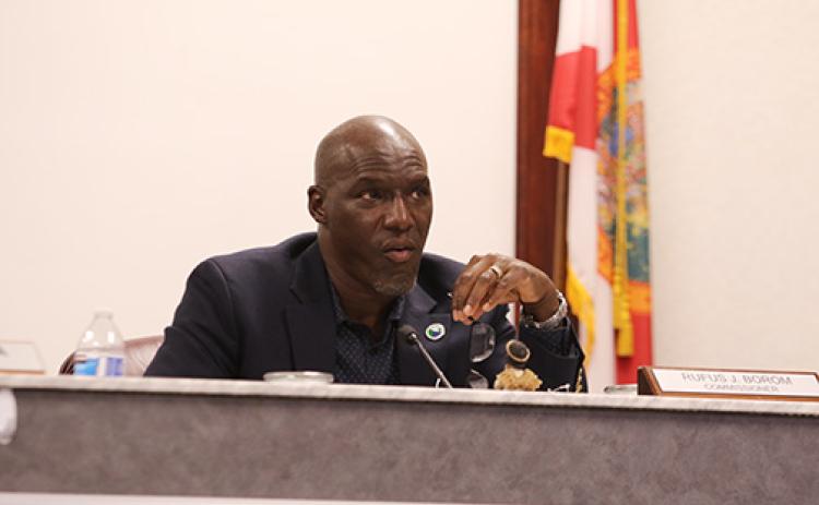 SARAH CAVACINI/Palatka Daily News. Palatka City Commissioner Rufus Borom listens to city officials Thursday during a board meeting. 