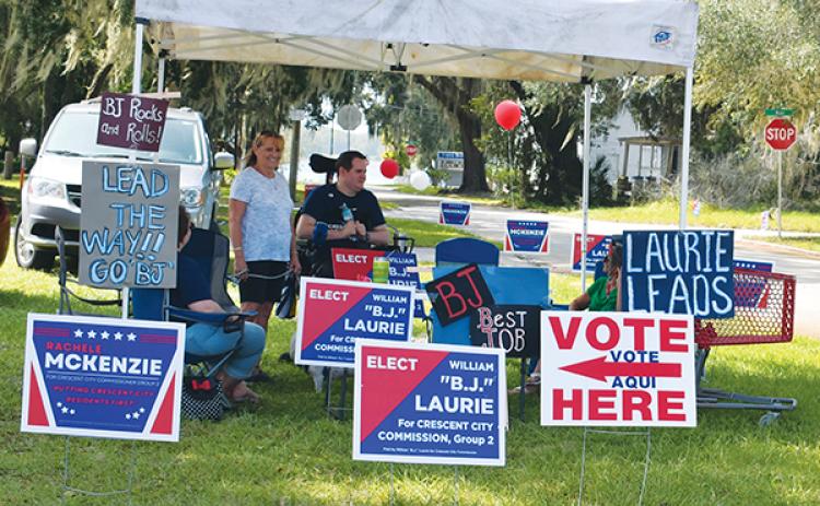 BRANDON D. OLIVER/Palatka Daily News – B.J. Laurie and some of his campaign volunteers are stationed outside of the polling location in Crescent City on Tuesday afternoon to encourage people to vote in the special election.